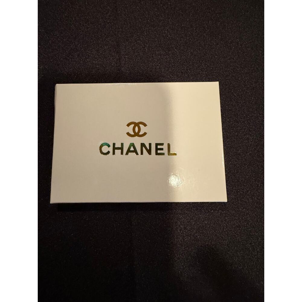 Chanel Silver Compact Mirror, featuring the brand's signature 3.5x2.5” New